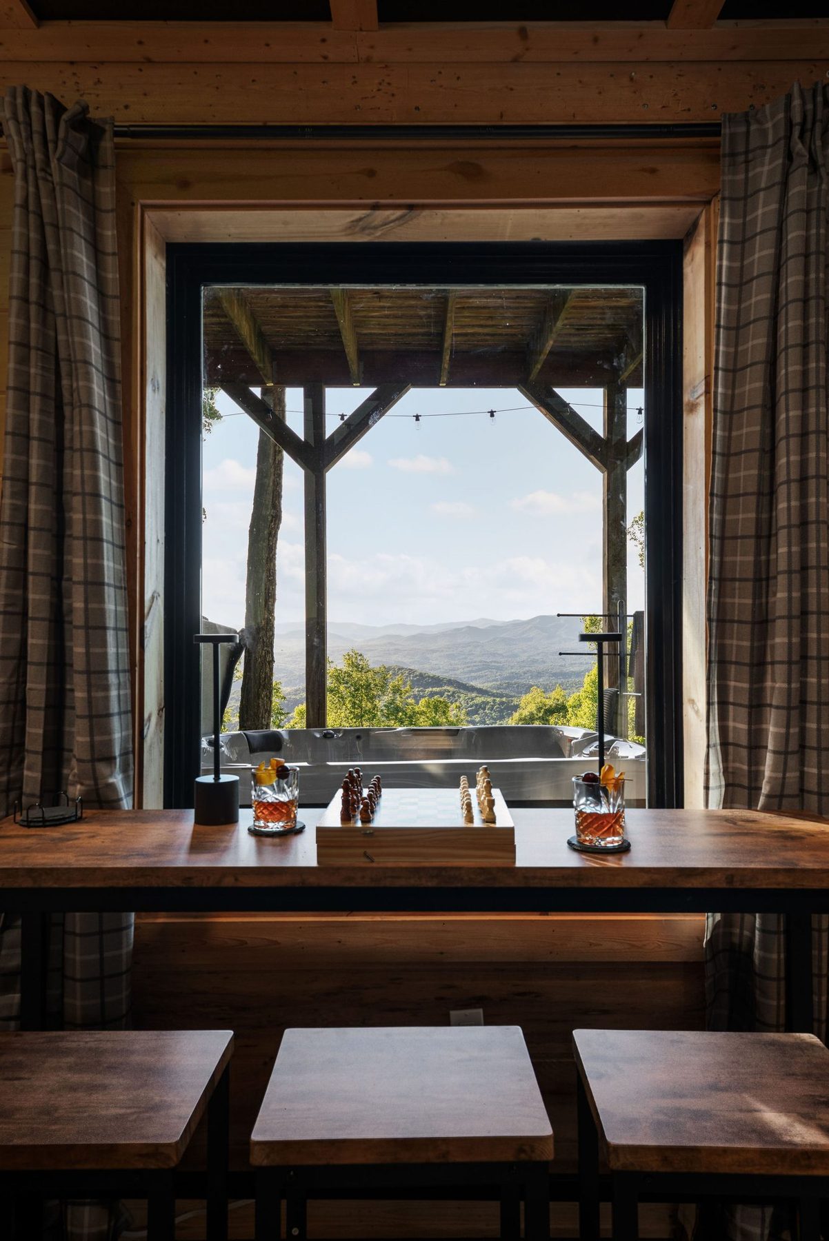 Dining nook at a window framing the Blue Ridge view